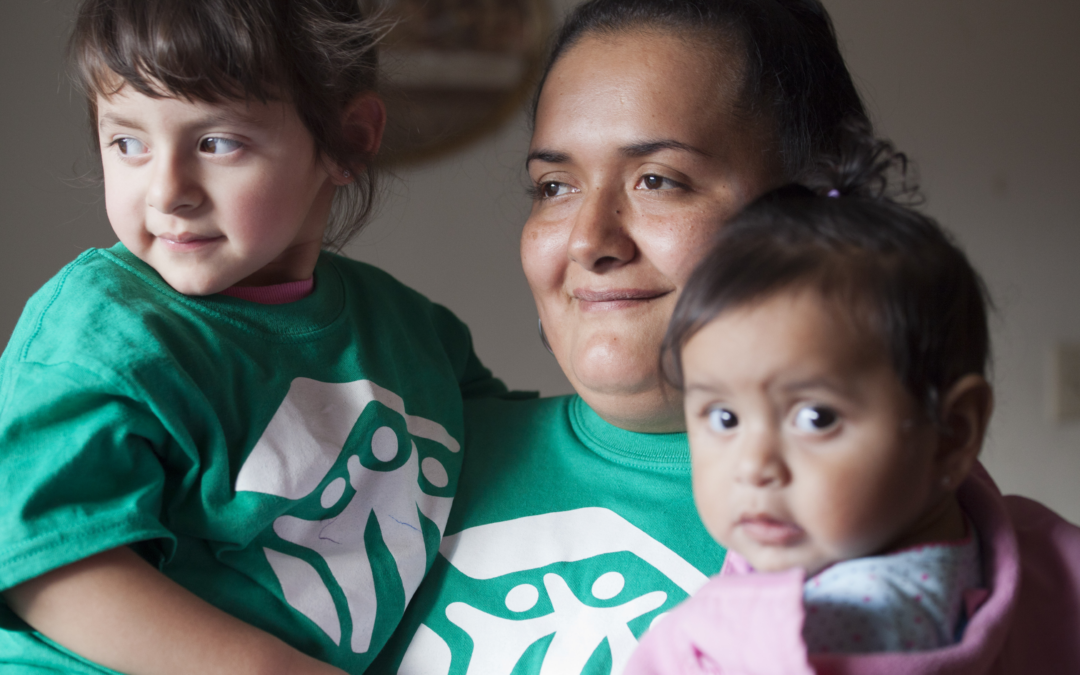 A woman and two children