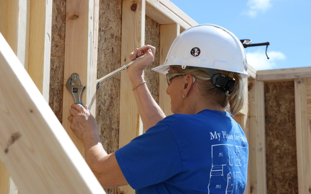 Volunteer securing bolts