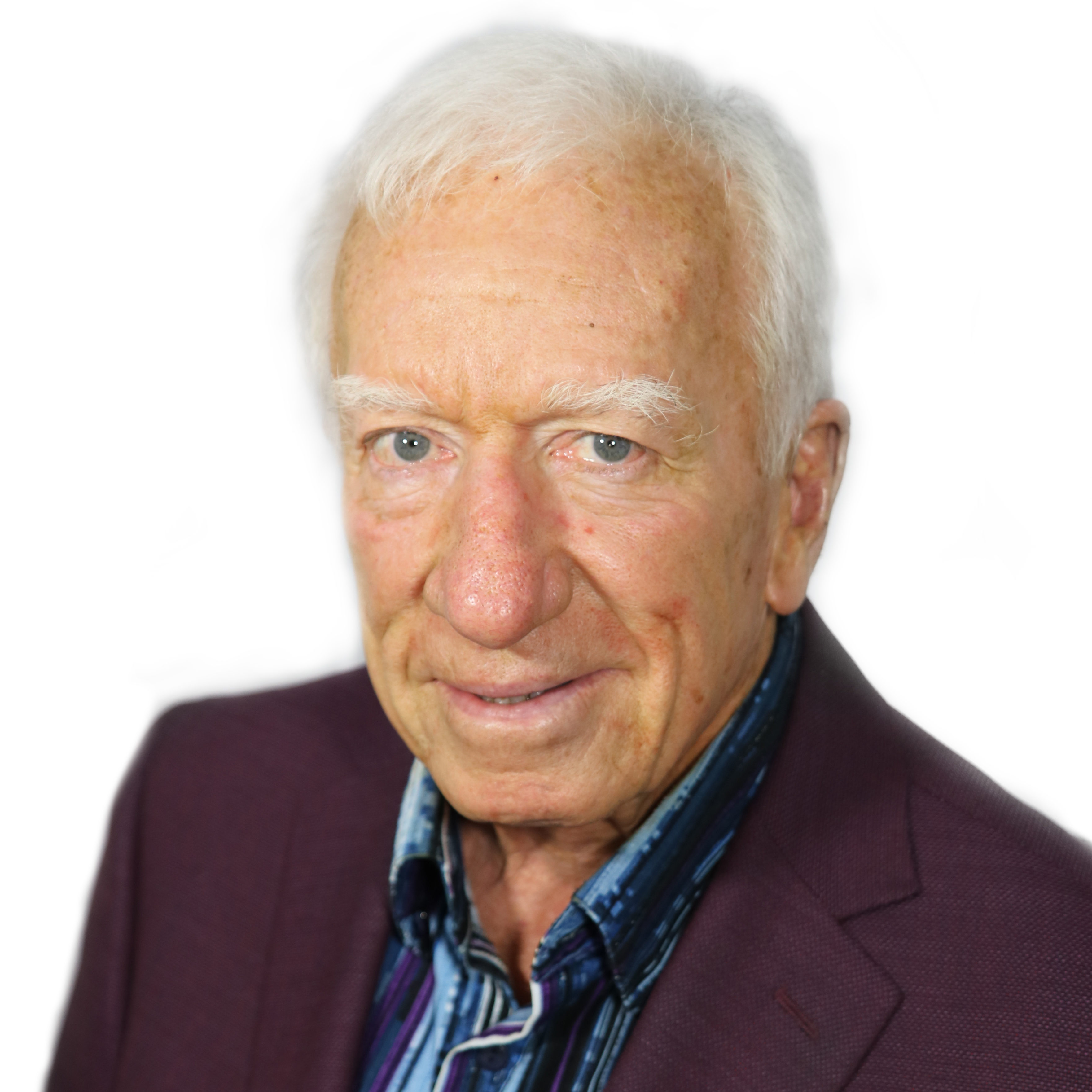 Business man smiling at camera in front of white background