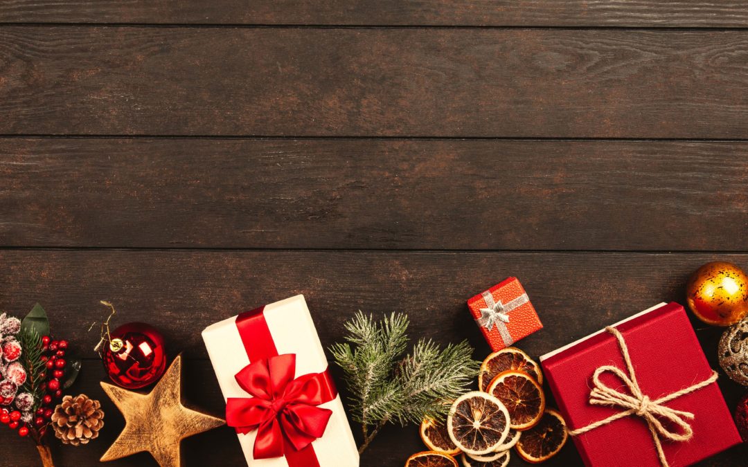 Festive holiday decorations on a wooden board background