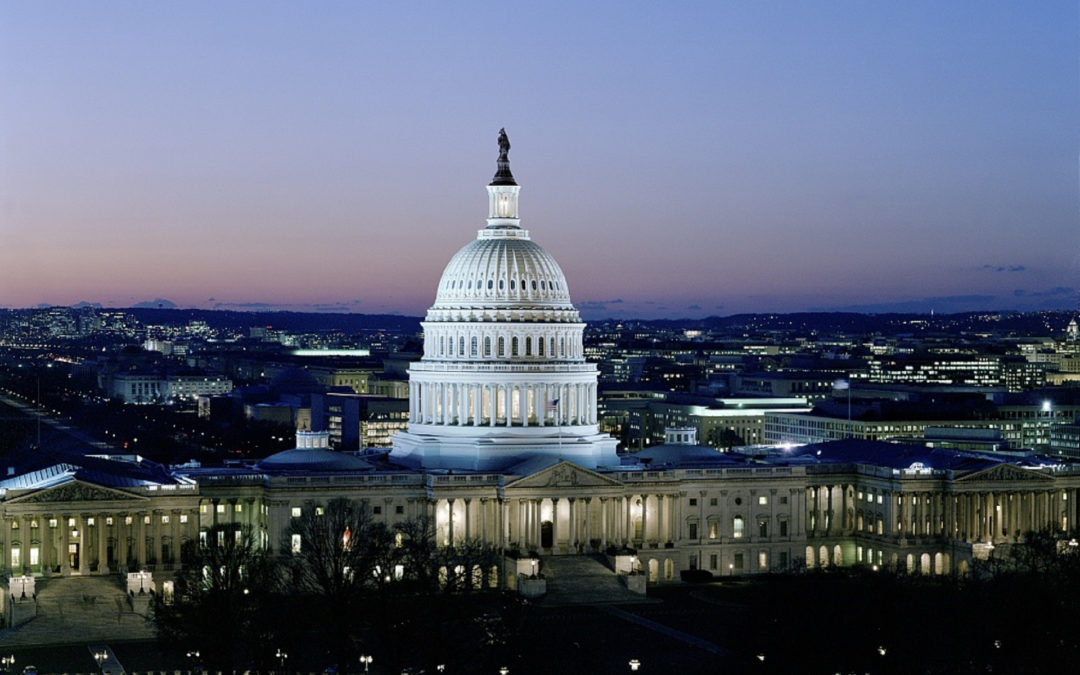 An aerial view of the U.S. Capitol building in the evening.
