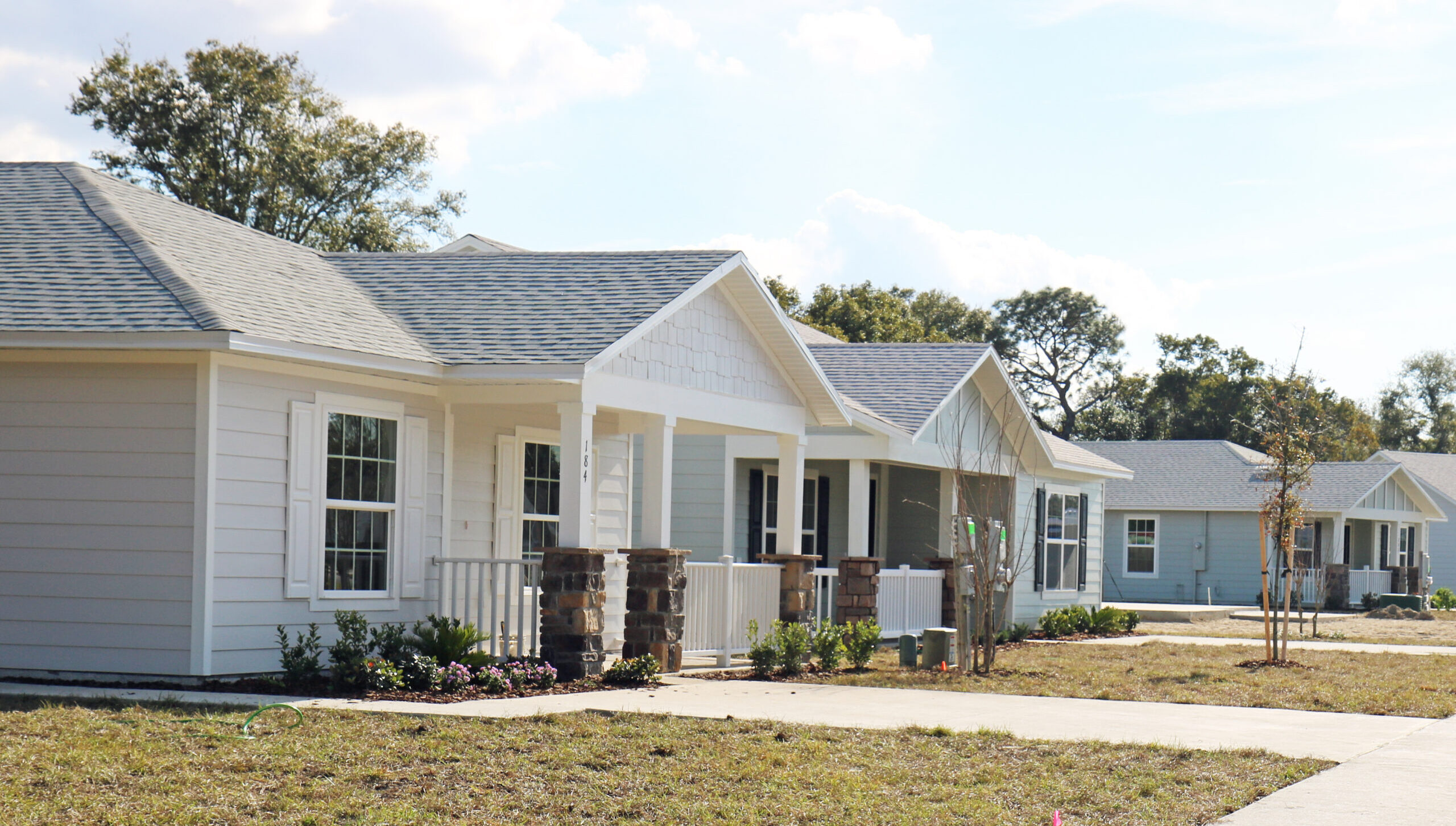 Our Arbor Bend neighborhood has models similar to our Holden Heights plans Row of four completed houses
