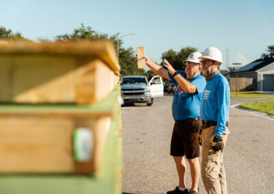 Crew leaders volunteer on a build site.